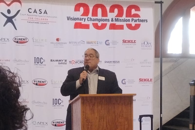 CASA Kane County Executive Director Jim Di Ciaula speaks at the annual Hands Around the Courthouse Thursday at the Kane County Courthouse in Geneva. The event is held in conjunction with April as National Child Abuse Prevention Month.