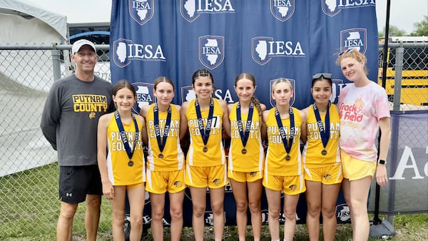 PC eighth-grader Anni Judd runs down four state medals