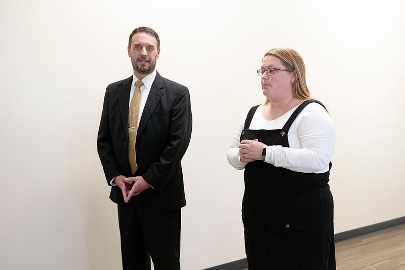 Andrew McFarlane and Heather Grobe of the Dixon YMCA welcome visitors Wednesday, Jan. 15, 2025, to the Y’s ribboncutting at the new child care center.