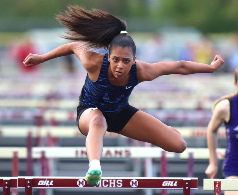 Woodstock’s Amina Idris cruises through the 100-meter hurdles in KRC Conference Track Meet action at Marengo High School in Marengo on Tuesday, May 6, 2025.