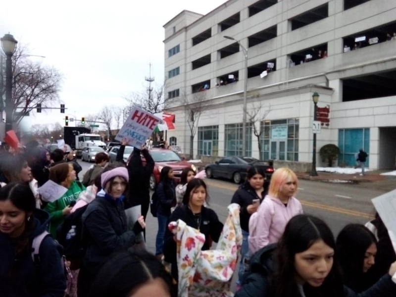 Joliet high school students march in downtown Joliet as part of a nationwide student walkout to protest actions by  Immigrations and Customs Enforcement on Friday, Feb. 6, 2026.