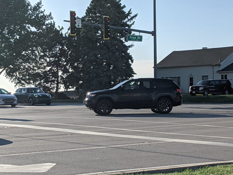 Motorists drive through the intersection of Caton Farm Road and Ridge Road on Wednesday, May 20, 2026.