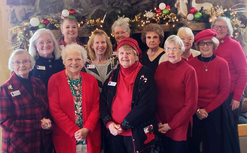 Members of the Chief Senachwine DAR Chapter pose in front of the holiday decorations at the Lake Thunderbird Clubhouse during their Dec. 5th Christmas party and potluck. In celebration of America 250, they shared information on the members' Revolutionary War patriots.