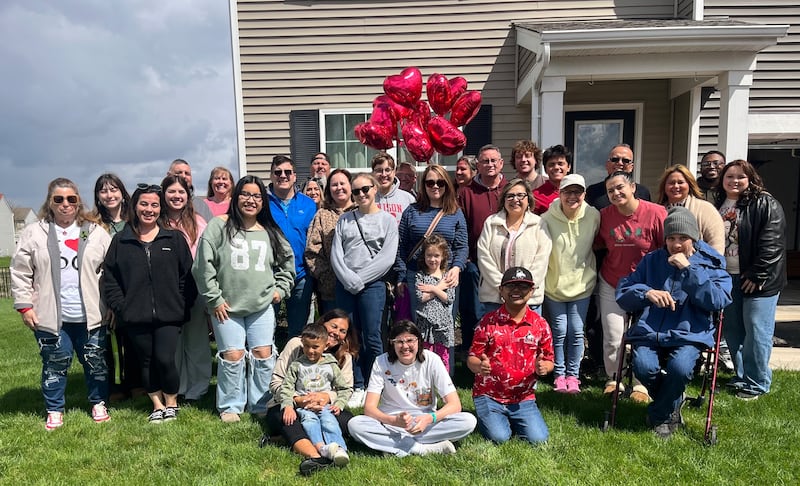 Friends and family gathered on April 19, 2026, to celebrate the 10-year anniversary of the heart transplant that gave Ricky De La Cruz, wearing a red shirt while kneeling in jeans, a second chance at life.