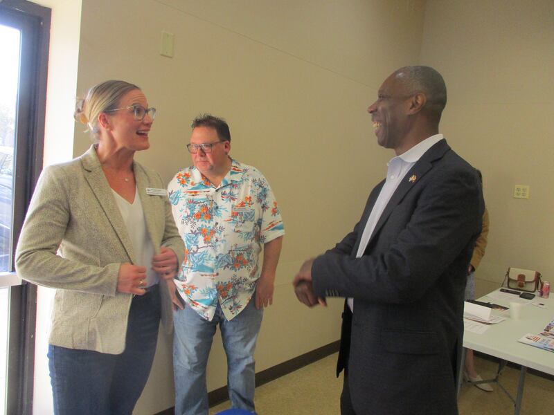 Anthony Vaughn, assistant director for the Illinois Department of Veterans Affairs, talks with Jen Solum, superintendent of the Will County Veterans Affairs Commission, at a Veterans Appreciation Breakfast on Saturday, Nov. 4, 2023 at the Plainfield Township Community Center in Plainfield.