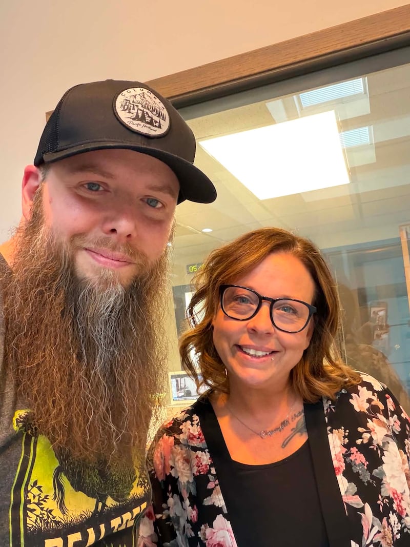 WIXN morning show host and news director Brandon Clark (left) poses with Cheyanne Bellows (right) on May 26, 2026, following Bellows’ appearance on the Talk Line segment.