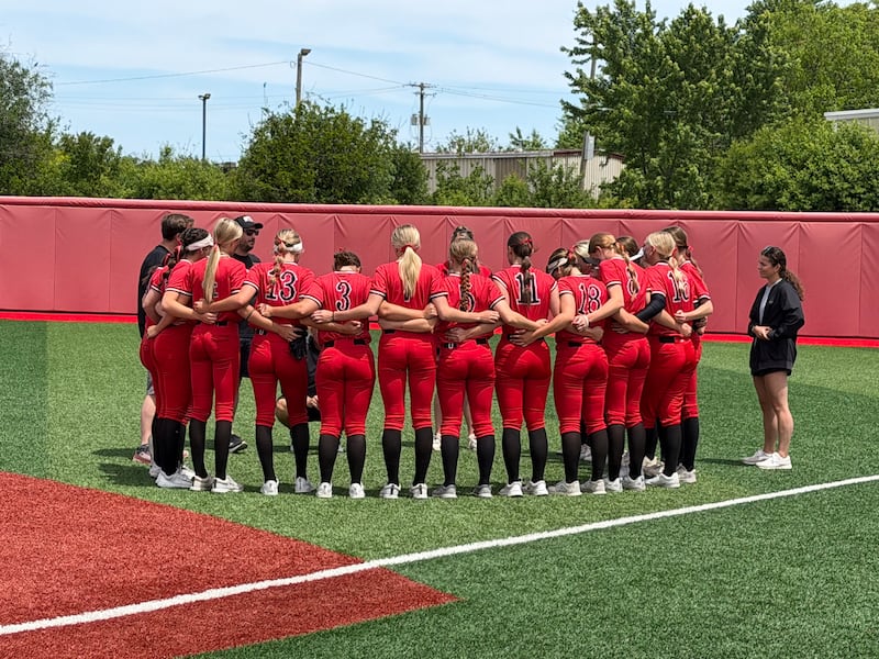Huntley's softball team huddles after a 2-0 loss to Barrington on Saturday, May 30, 2026, at Barrington's Field of Dreams in Barrington.