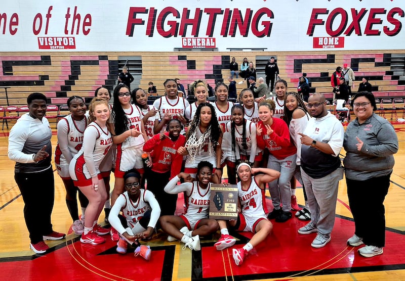 The Bolingbrook girls basketball team poses with its freshly won Class 4A Yorkville Regional championship plaque Thursday, Feb. 19, 2026, in Yorkville.