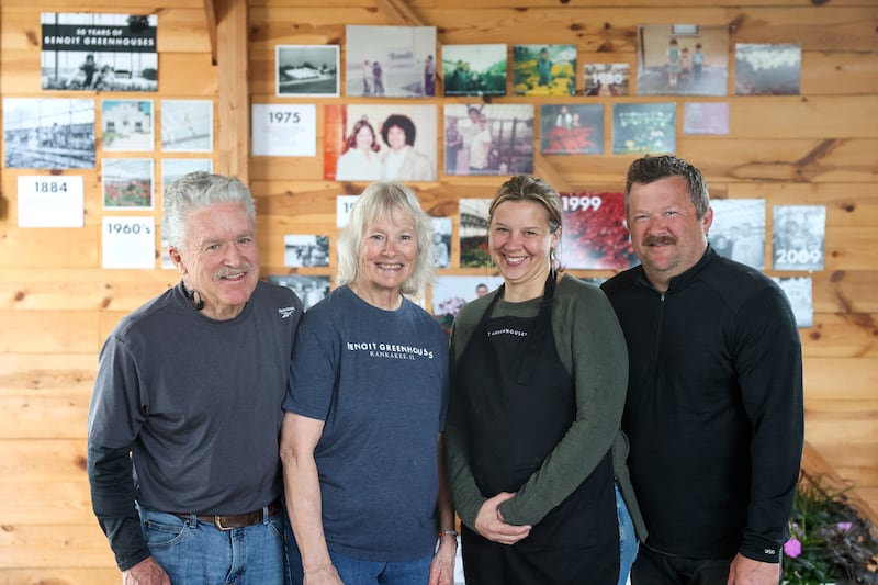 Mandy and Luke Benoit, right, stand with Luke’s parents, Vince and Christine Benoit, inside the store at their family-owned business Benoit Greenhouses in Kankakee.