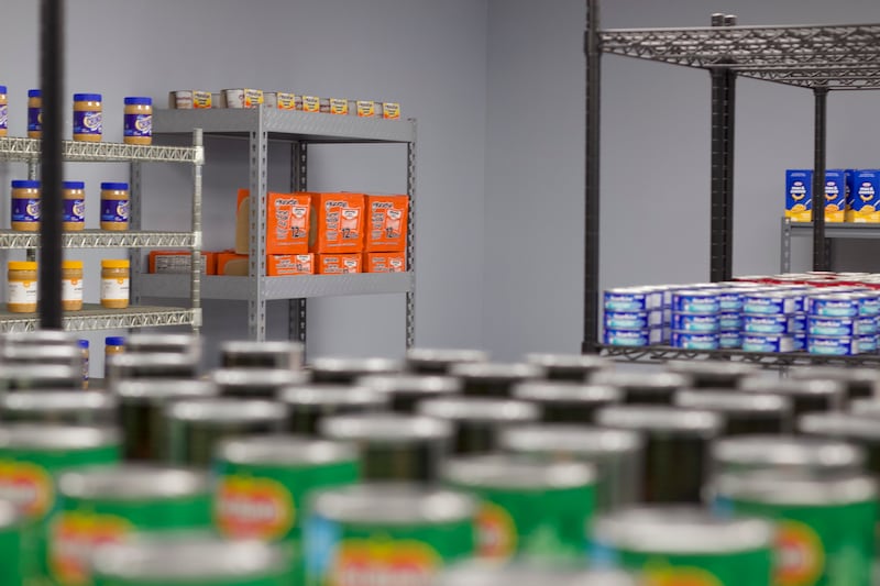 Shelves of canned food seen on Monday, April 21, 2025, at the Joliet Township Forest Park Community Center in Joliet.