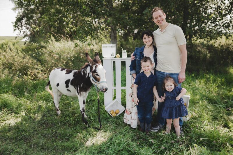 Andrew and Ariana Sampson of Channahon created Spectrum Circle, an app to help neurodivergent families connect with each other. They are pictured with their son Sterling, 4, and their daughter Holly, 2.