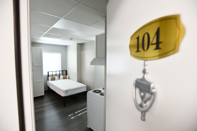 A door opens to a single-bedroom apartment in the Liberty Lodge property at 210 S. Washington Ave. in Kankakee, which has the space to house 14 homeless veterans.