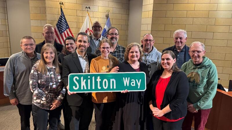 Pictured (from left) are Montgomery Village Trustee Matt Bauman, Montgomery Village Clerk Debbie Buchanan,  Montgomery Village Trustee Theresa Sperling, Montgomery Village President Matt Brolley, Montgomery Village Trustee Ben Brzoska, Oswego Library District Board Member Emily Ramirez, Montgomery Village Trustee Doug Marecek, former Executive Director of the library Sarah Skilton, Montgomery Village Trustee Dan Gier, Executive Director of the library Krista Katzen , vice president of the Oswego Library District Board Pete Wallers, and president of the Oswego Library District Board Terry Tamblyn on Dec. 8, 2025 at Montgomery Village Hall.