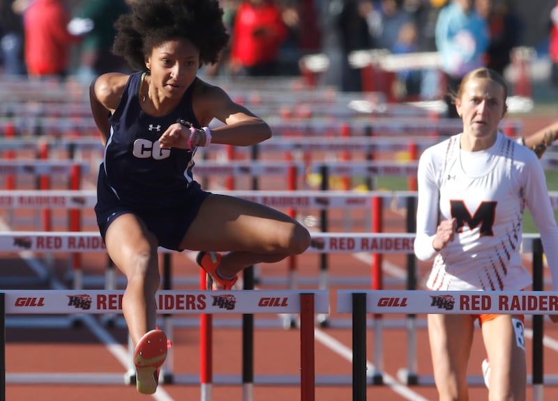 Cary-Grove’s Olivia Parker cruises to victory in the 100 meter hurdles on Thursday, May 8, 2025, during the Fox Valley Conference Girls Track and Field Meet at Huntley High School.