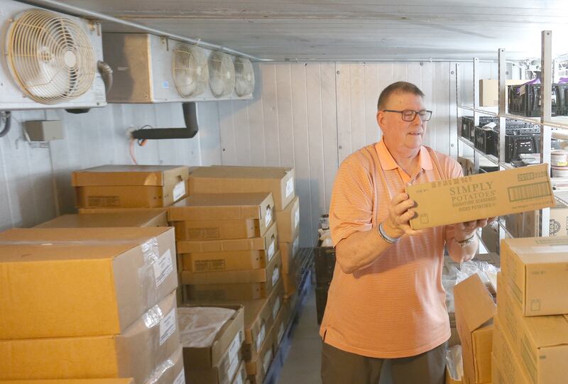 Joe Nagle, volunteer at the Hall Township Food Pantry, stacks a pallet of potatoes inside the deep freezer on Thursday, June 12, 2025 inside the pantry in Spring Valley. The Hall Township Food Pantry needed urgent repairs requiring $11,300 and counting. Summer is the busiest time at the food pantry with schools out for summer it makes it difficult to fufill the food needs for families. The food pantry is asking for donations to help cover the steep cost. 
You can make a donation at www.halltwpfoodpantry.org or stop by the food pantry located at 500 N. Terry St.
Spring Valley, IL  61362.