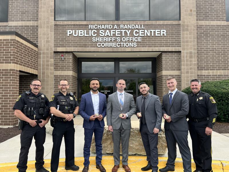 Left to right, Kendall County Sheriff Deputy Commander Kevin Vaclavik,  Deputy Commander Caleb Waltmire, Deputy Anas Mirza, Deputy Josh Whitley, Deputy Juventino Aguirre, Deputy Luke Lanehart and Undersheriff Bobby Richardson.