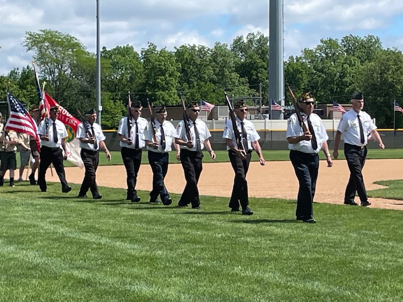 Veterans, boy scouts and cub scouts process to Memorial Day services Monday, May 27, 2024, in Washington Park, Peru. The Peru Veterans Memorial Group honored former state Sen. Gary Dahl, who died Oct. 1, at this year's observances for all the work Dahl had done on behalf of veterans in the Illinois Valley.