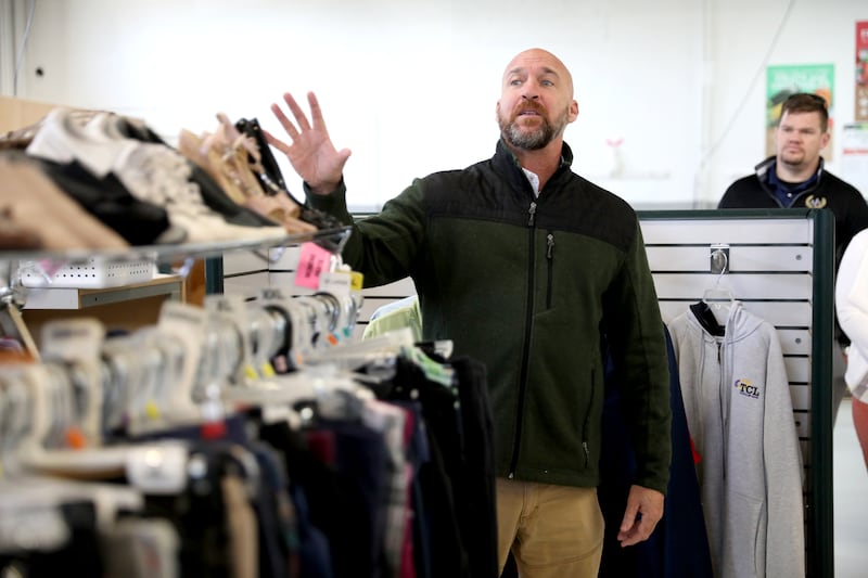 Kendall County Food Pantry Executive Director Alex Hurd gives a tour of the newly refurbished facility during an open house and ribbon-cutting ceremony on Wednesday, April 16, 2025 in Yorkville.