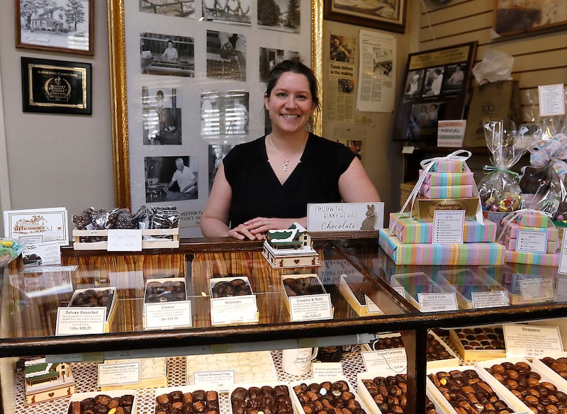 Katie Anderson-Tedder is shown with some of the history to her family’s candy shop on Thursday, March 27, 2025, at Anderson's Candy Shop in Richmond.