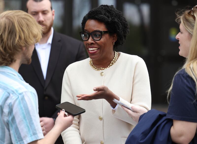 U.S. Rep. Lauren Underwood, D-Naperville, talks to reporters Wednesday, April 23, 2025, during a rally to support Northern Illinois University’s international students, faculty and staff. The event was held in front of Founders Memorial Library at NIU in DeKalb.