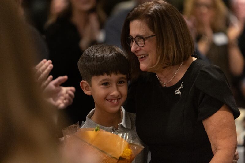 Martha Sanchez is surprised by family after being rewarded the Wood award at the Geneva Chamber of Commerce Awards Dinner on Thursday, Nov. 6,2025 in Geneva.