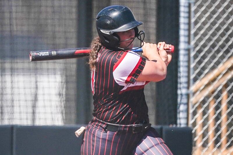 Yorkville's Kayla Kersting hits an RBI triple against Antioch during a nonconference softball game at Yorkville High School on Saturday, April 12, 2025.