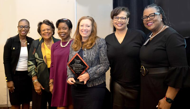 ane County State's Attorney Jamie Mosser (center) receives the Women of
Power Award Sept. 21 from the Quad County Urban League at annual Women's Empowerment Summit. Also from left are Theodia Gillespie, President and CEO; Board Member Dianne Engram; Director of Government Affairs Kay Page; Senior Manager of Strategic Planning Carla Dennis; and Board Chair Nina Hunter.