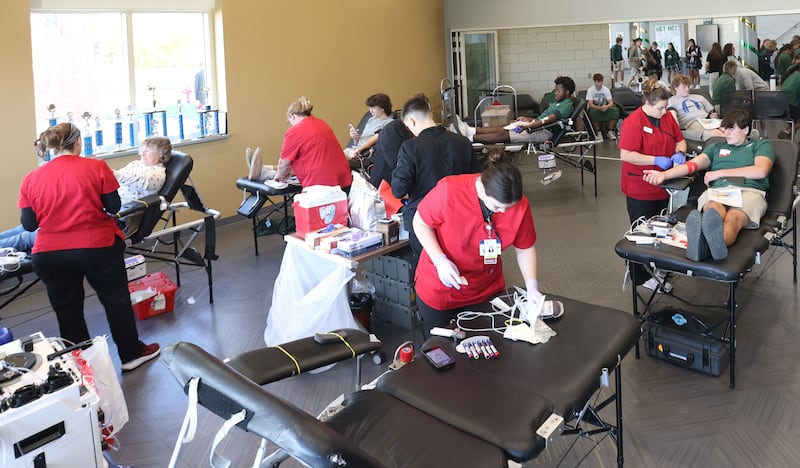 Students give blood during the Saint Bede Community Blood Drive on Tuesday, Nov. 4 in the Perino Science Center at St. Bede Academy. The goal was to collect 100 pints this school year. If the school reaches it's goal, the Red Cross will award a $1,000 scholarship to one graduating senior.