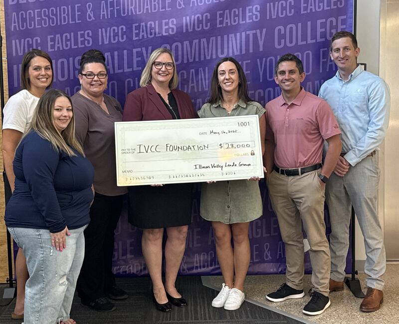 The IV Leads young professionals group recently presented Illinois Valley Community College with a $28,000 check to create an endowment fund at the College. Pictured are (from left) Danielle DeCarlo, Rachel Balestri, Jennifer Roulston, College President Tracy Morris, Spencer Luecke, Zack Giovanine and Neal Knauf.