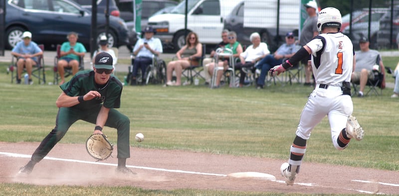 Rock Falls first baseman Owen Laws makes a play while Winnebago runner Brenden Erickson is safe at first in Saturday's Class 2A Rock Falls Regional title game. Winnebago won the game and the title 9-3.