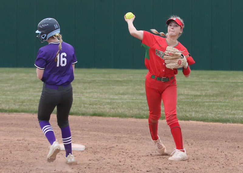L-P's Taylor Vescogni throws to first base to turn a double play after stepping on the bag to force out Rochelle's Briel Metzger on Wednesday, April 10, 2024 at the L-P Athletic Complex in La Salle.