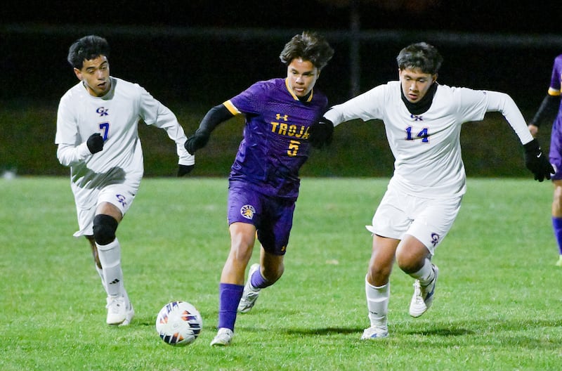 Mendota’s Mauricio Salinas (5) takes control of the ball against Genoa-Kingston's Ulises Ayala-Zavala (7) and Josue Leon (14) during the Class 1A Indian Creek Sectional Semifinal in Waterman on Wednesday, Oct. 29, 2025.
