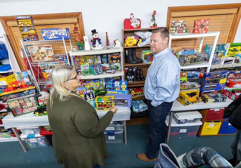Goodfellows President Clara Harris speaks to LECAT Director Dane Simpson Thursday, Nov. 14, 2024, while giving a tour of the facility to the labor groups that donated to the organization.