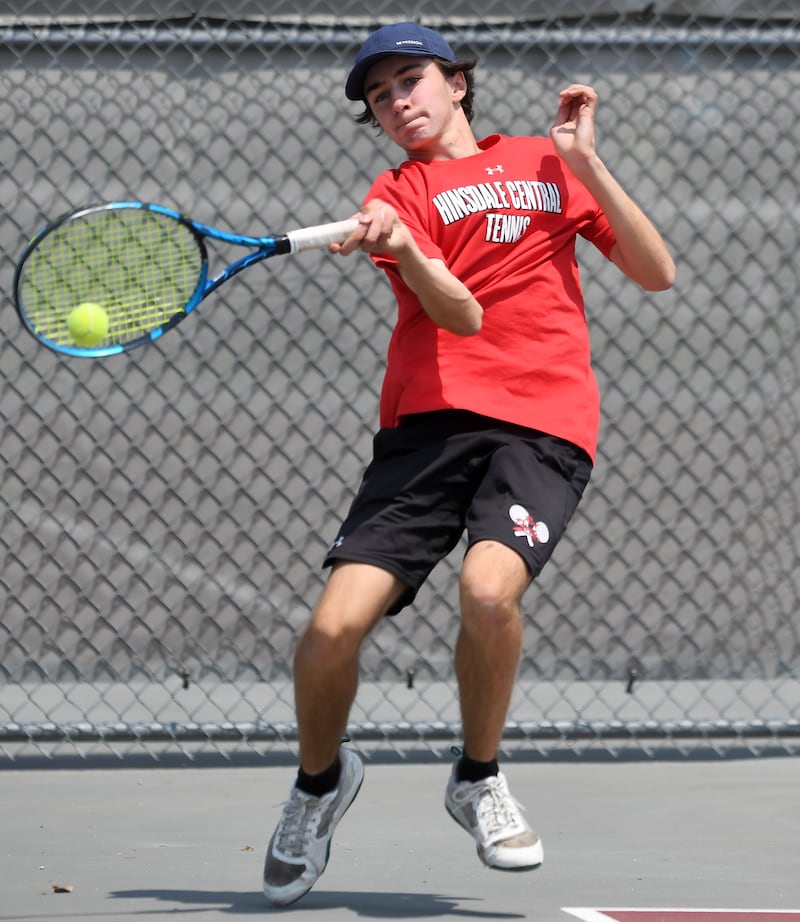Hinsdale Central’s Nicholas Marringa returns the ball in the Class 2A doubles championship match during the boys state tennis tournament on Saturday, May 31, 2025 in Palatine.