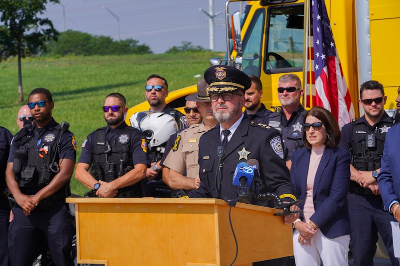 In front of law-enforcement officials from various Illinois agencies, Joe Leonas, police chief of Lincolnshire and president of the Illinois Association of Chiefs of Police, speaks at a news conference July 22, 2025, at the Illinois Tollway headquarters in Downers Grove about the dangers of speeding.
