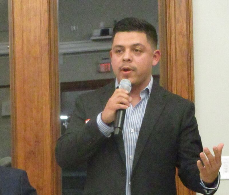Juan Moreno makes a point during the forum for Joliet City Council candidates at the Joliet Public Library on Thursday. Feb. 19, 2025.