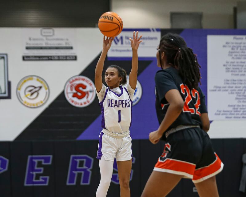 Plano's Le'Niya Viser (1) shoots a jumper during their basketball game between Sandwich at Plano Tuesday, Dec 2, 2025 in Plano.