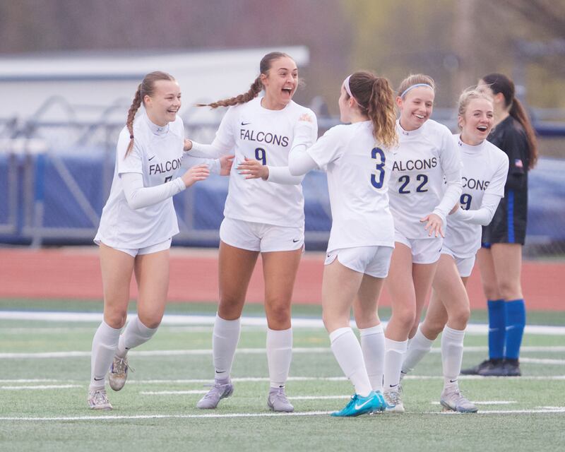 Wheaton North's Talia Kaempf (9) celebrates scoring a goal against St. Charles North on Thursday, April 10,2025 in St. Charles.