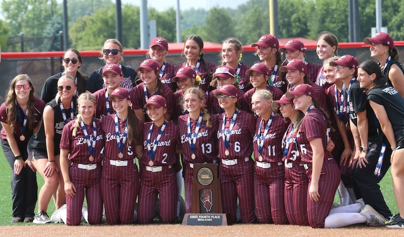Members of the Lockport softball team pose with the Class 4A fourth place trophy after falling to Oak Park River Forest on Saturday, June 14, 2025 at the Louisvile Slugger Complex in Peoria.