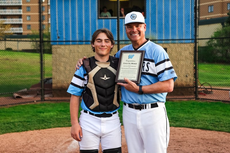 Troy Wisner, a senior on Willowbrook High School's 2025 baseball team, was the Warriors catcher when his father, Vic, won his 300th game in April 2025.