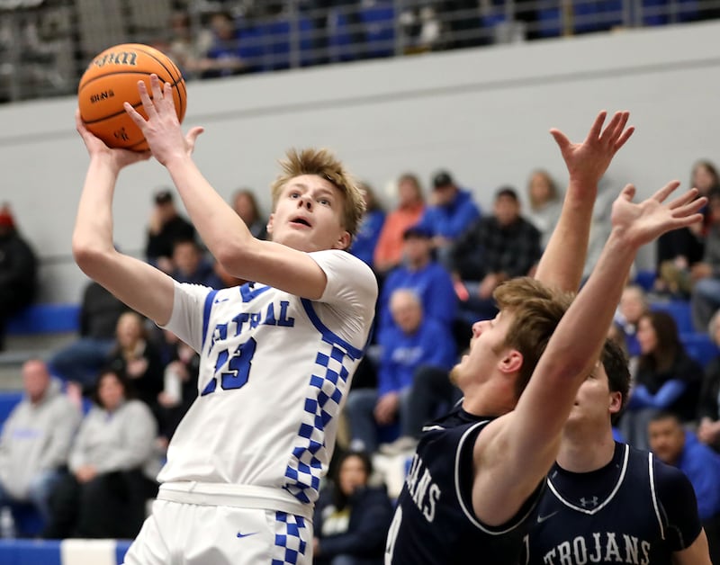 Burlington Central's Declan Wilson shoots the ball in from to fCary-Grove's Brandon Freund during a Fox Valley Conference boys basketball game on Friday, February. 6, 2026, at Burlington Central High School.
