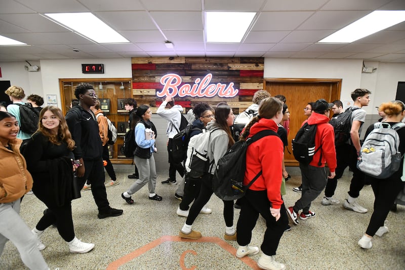 Students navigate during a passing period at Bradley-Bourbonnais Community High School in March 2024.