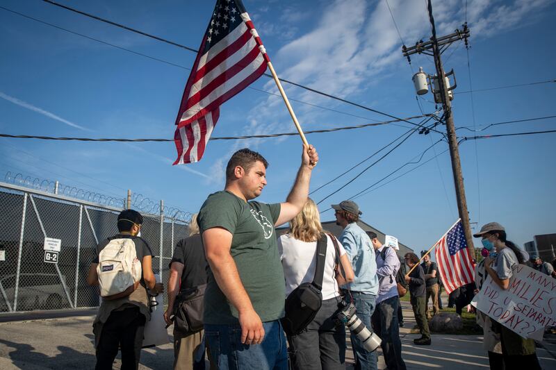 Protesters demonstrate outside of the Immigration and Customs Enforcement facility in Broadview, Friday, Sept. 19, 2025. (Zubaer Khan  /Chicago Sun-Times via AP)
