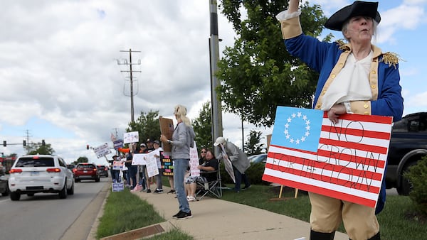 Photos: Protesters rally against Trump in McHenry