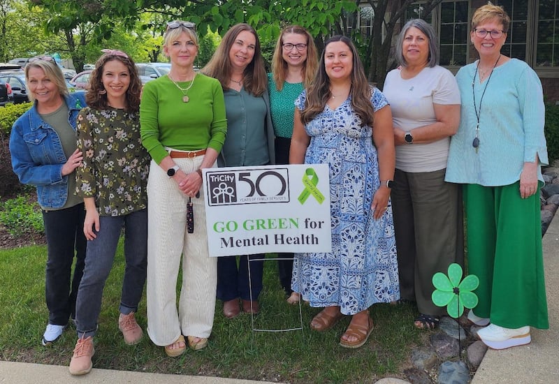 TriCity Family Services staff members Cathy Shultz (from left), Izzie Moretti, executive director Laura Poss, staff members Laura Jania, Bryanna Klinetobe, Trisha Bularzik, Jules O'Neal and Laura Stoney