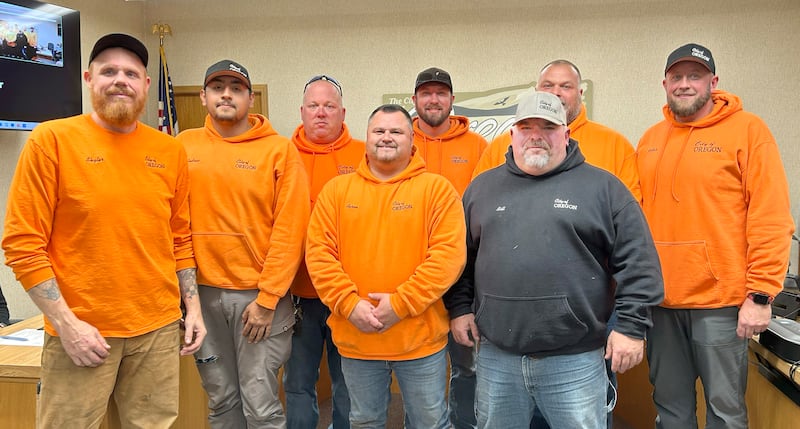 Oregon Public Works employees were recognized for their efforts during the Nov. 25, 2025 city council meeting. Pictured are Skyler Bethel, Aaron Montoya, Jeff Pennington, Josh Pickering, Scott Wallace, Jordan Plock, Andrew Bonilla, and Director Bill Covell. Aidan Ellsworth was absent when the photo was taken.