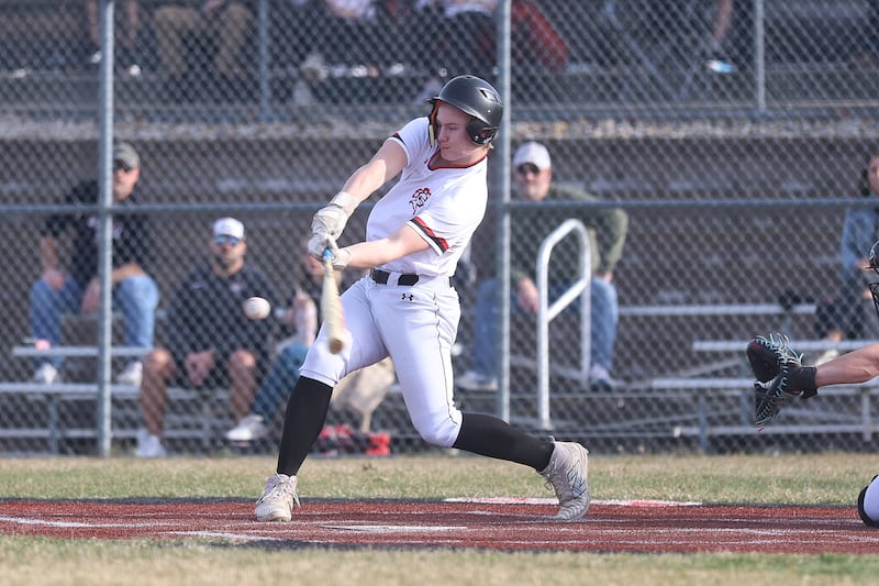 Lincoln-Way Central’s Austin Welch puts the Knights on the board with a RBI single against Joliet Catholic on Wednesday, March 25, 2026 in New Lenox.