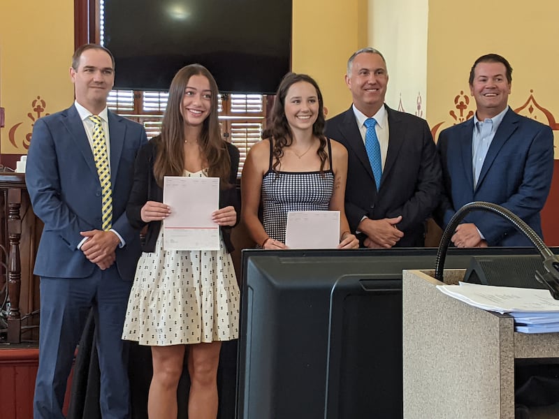 Standing left to right are Kendall County Assistant State's Attorney Ryan Phelps, Yorkville High School graduate Julia Hosu, Oswego High School graduate Madeline Mundsinger, Kendall County State's Attorney Eric Weis and Kendall County Board Vice Chairman Scott Gengler.