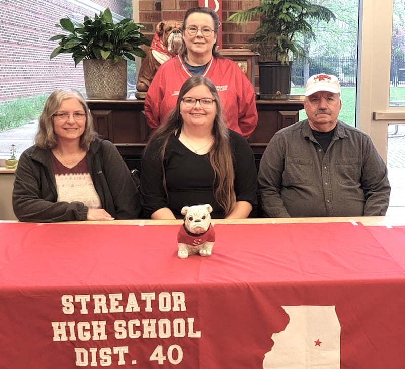 Streator High School's Lyla Gengler has signed on to continue her education at Mount Mercy University in Cedar Rapids, Iowa, and her bowling career at the NAIA level with the Mustangs. Seated at center, she is pictured at her signing ceremony bookended by Belinda and Gary Ondrey, with Streator High bowling coach Nancy Longnecker standing behind.