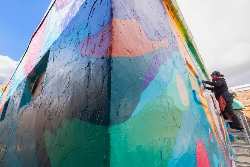 The mural makes its way around the corner to the south side of the building. A small sidewalk there connects First Avenue with the back alley. About the little used walkway: “I think it’s great they wanted to include that side as well as an inspiration,” Hermes said.